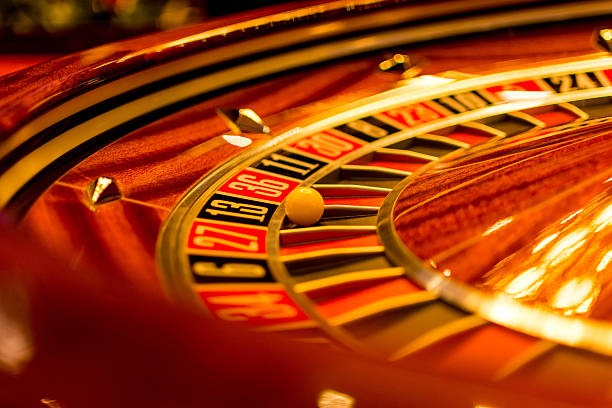 Multi-Bet ticket builder showing selections from football, badminton, and MotoGP matches